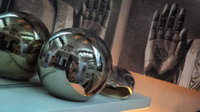 Load image into Gallery viewer, Chrome Crate &amp; Barrel Sphere &amp; Abbott Pebble **pebble is missing an end - sphere has discoloration marks** SHELF INCLUDED
