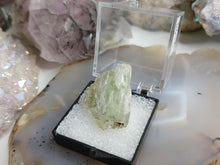 Load image into Gallery viewer, Hiddenite Kunzite Crystal in Display Case
