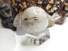 Load image into Gallery viewer, Black Tourmalinated Quartz Sphere with Stand
